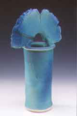 Wheel thrown and hand built porcelain with airbursh glaze.