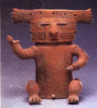 Precolumbian hollow-slab  anthropomorphic figure with eagle headdress.